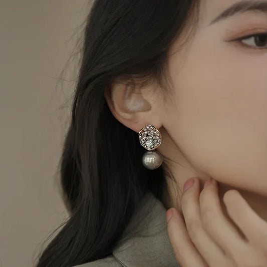 Boucles d’oreilles ornées de cristaux et de perles
