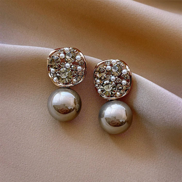 Boucles d’oreilles ornées de cristaux et de perles