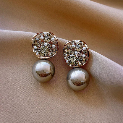 Boucles d’oreilles ornées de cristaux et de perles