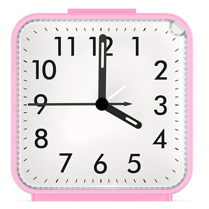 Travel alarm clock with illuminated hands