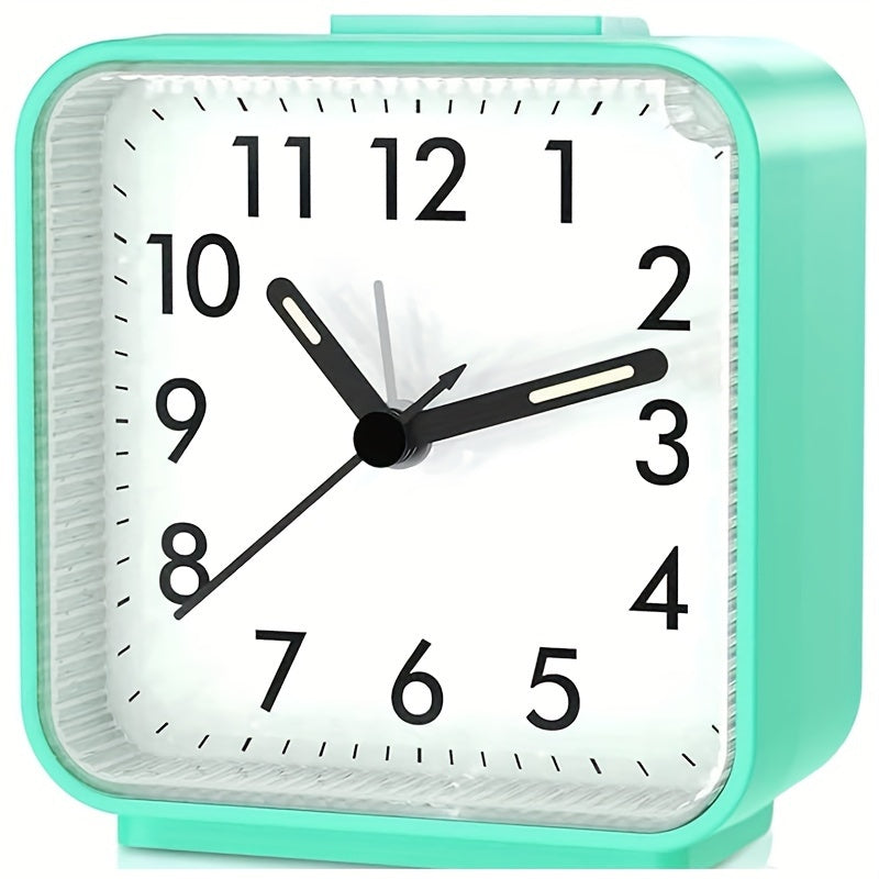 Travel alarm clock with illuminated hands