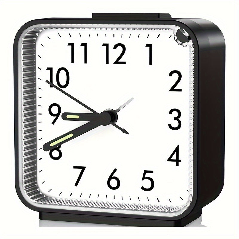 Travel alarm clock with illuminated hands