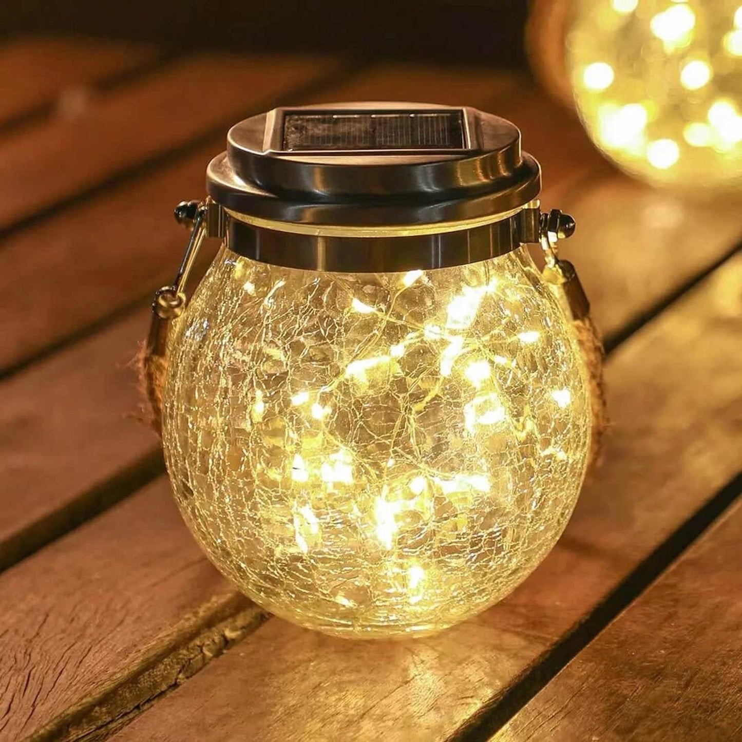 Solarna lampa ogrodowa LED ze szklanym kloszem i wzorem geometrycznym