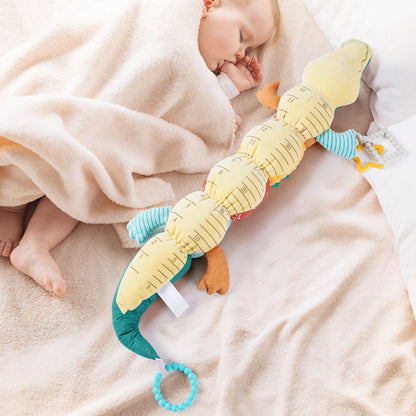 Crocodile sensoriel en peluche