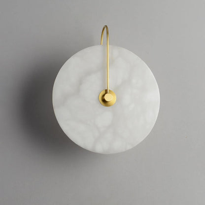 Alabaster wall light with a round shade