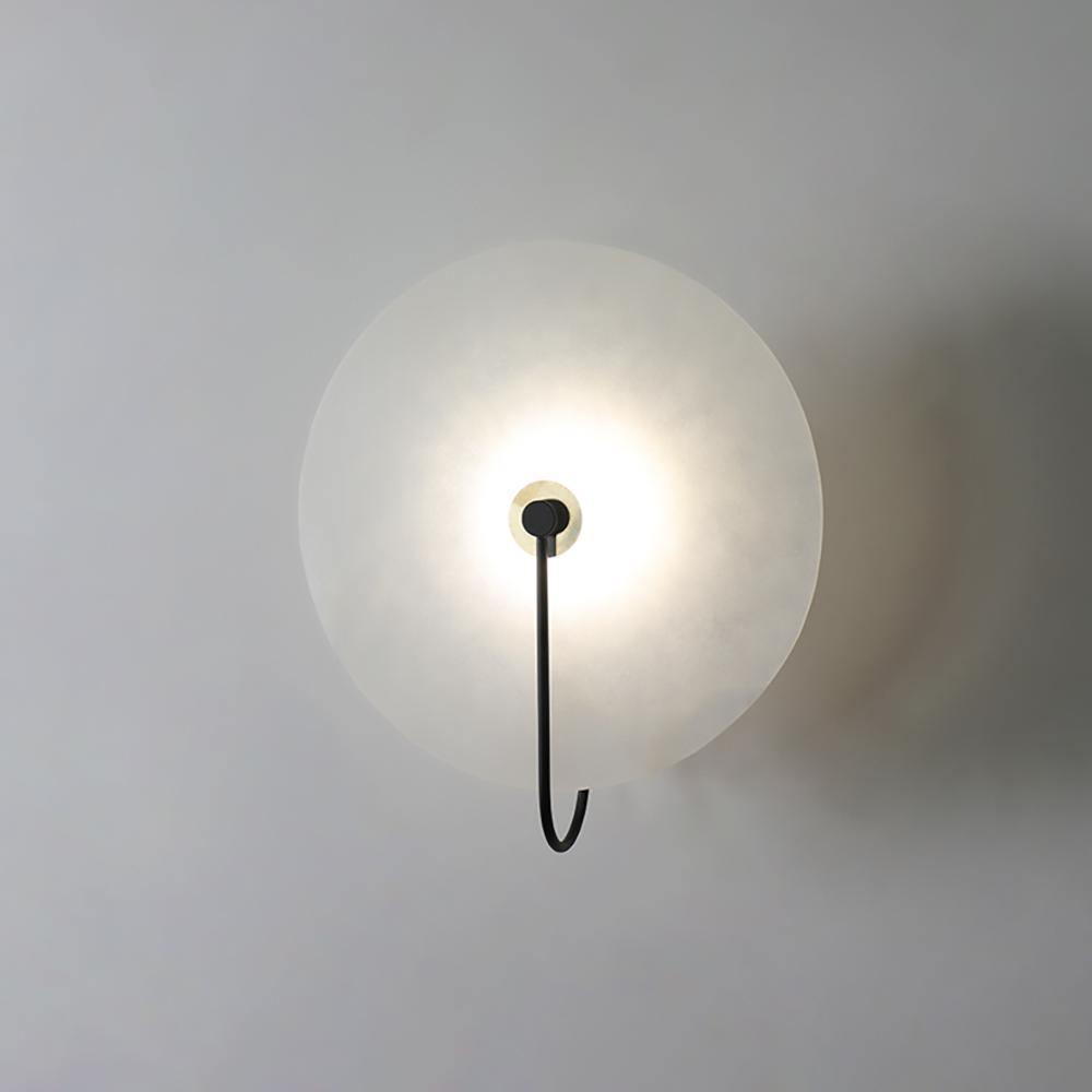Alabaster wall light with a round shade