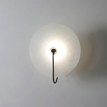 Alabaster wall light with a round shade