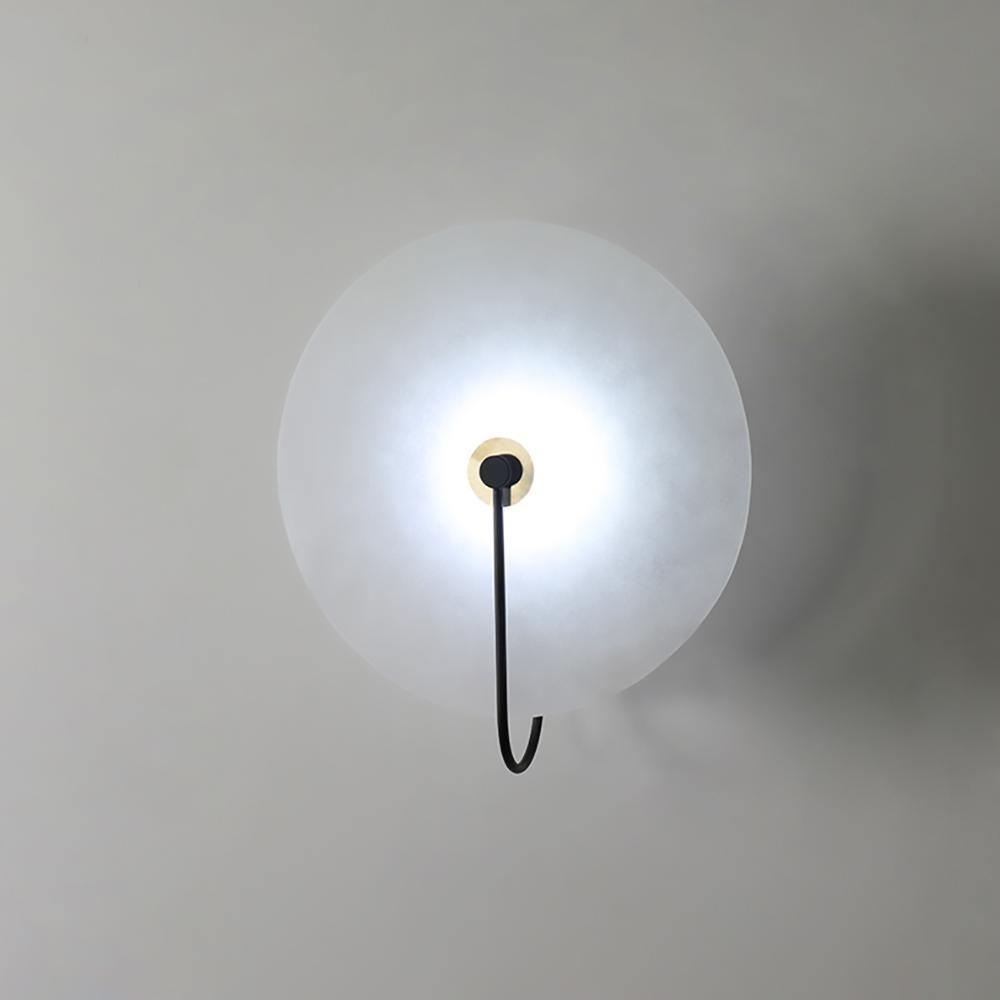 Alabaster wall light with a round shade