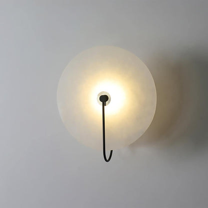 Alabaster wall light with a round shade