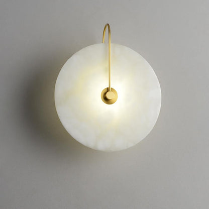 Alabaster wall light with a round shade