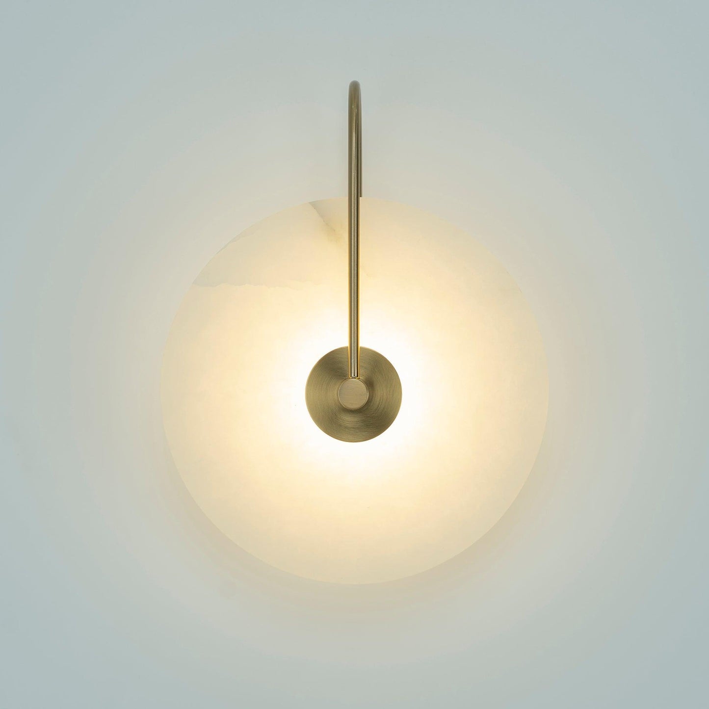 Alabaster wall light with a round shade