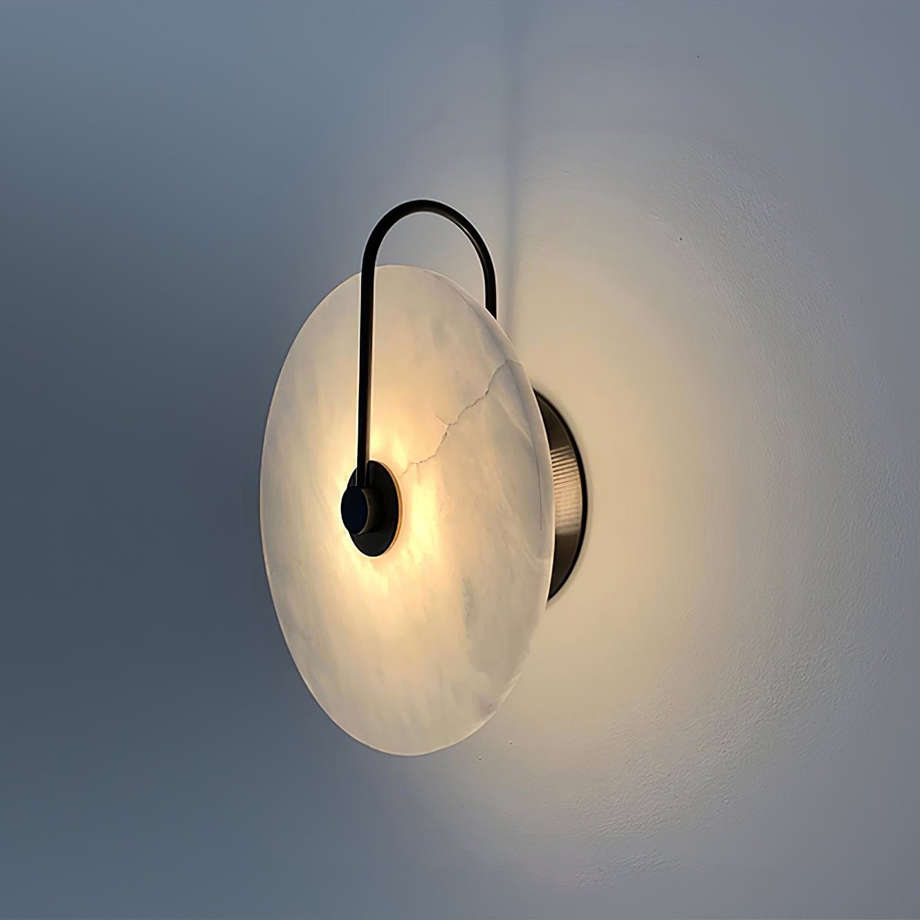 Alabaster wall light with a round shade