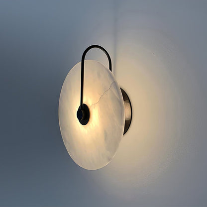 Alabaster wall light with a round shade
