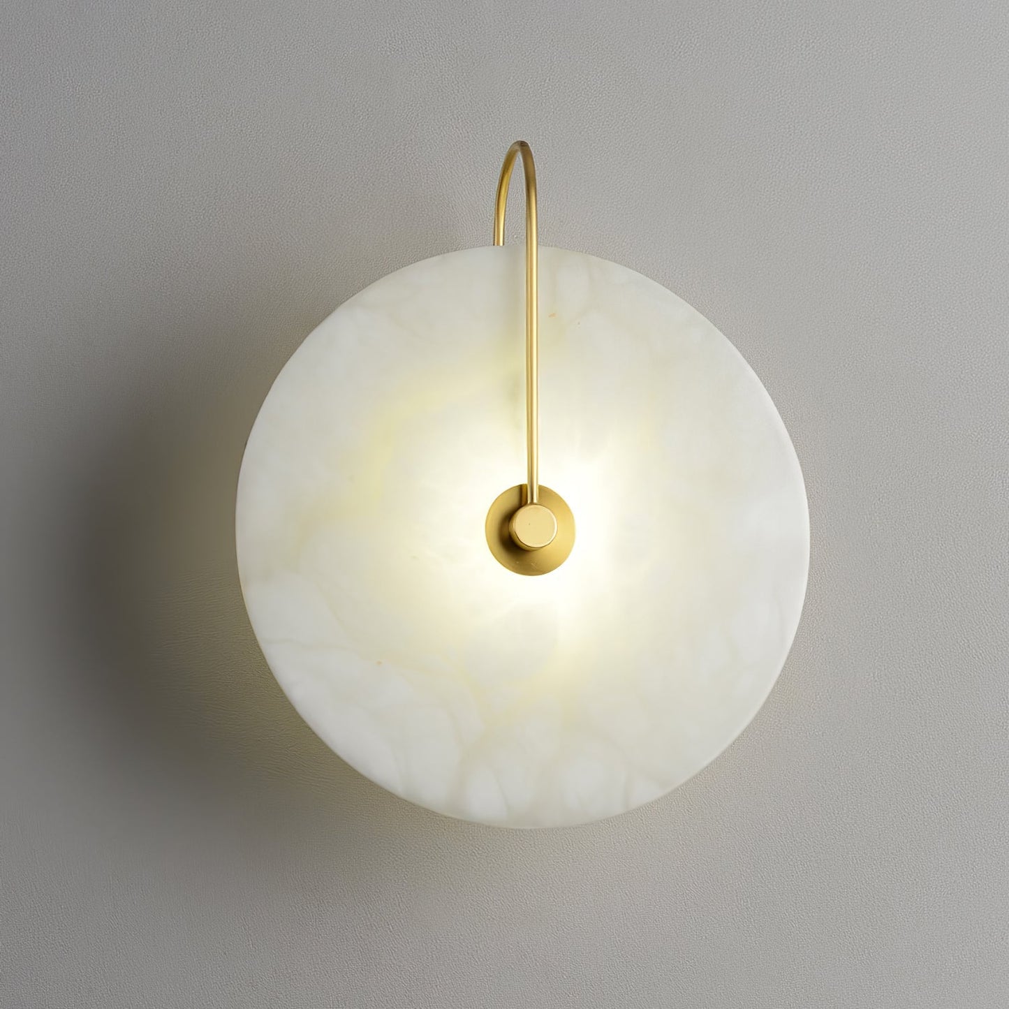 Alabaster wall light with a round shade
