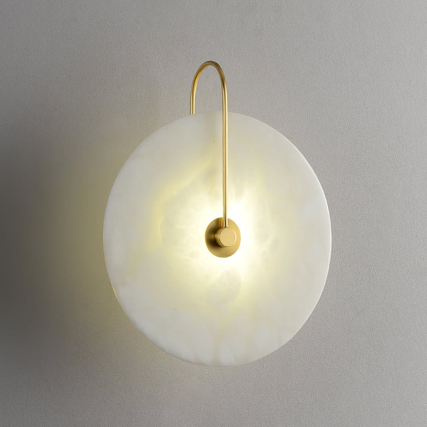 Alabaster wall light with a round shade