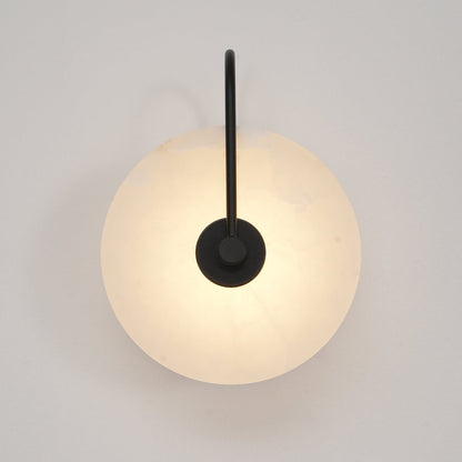 Alabaster wall light with a round shade