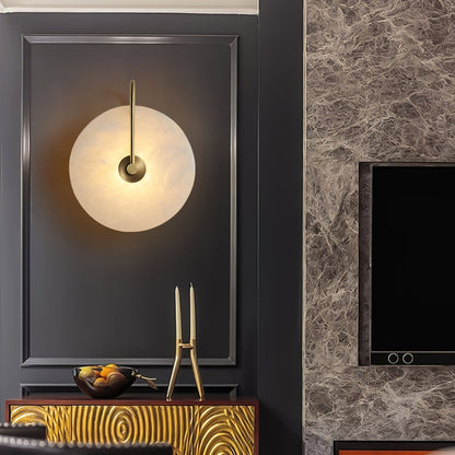 Alabaster wall light with a round shade