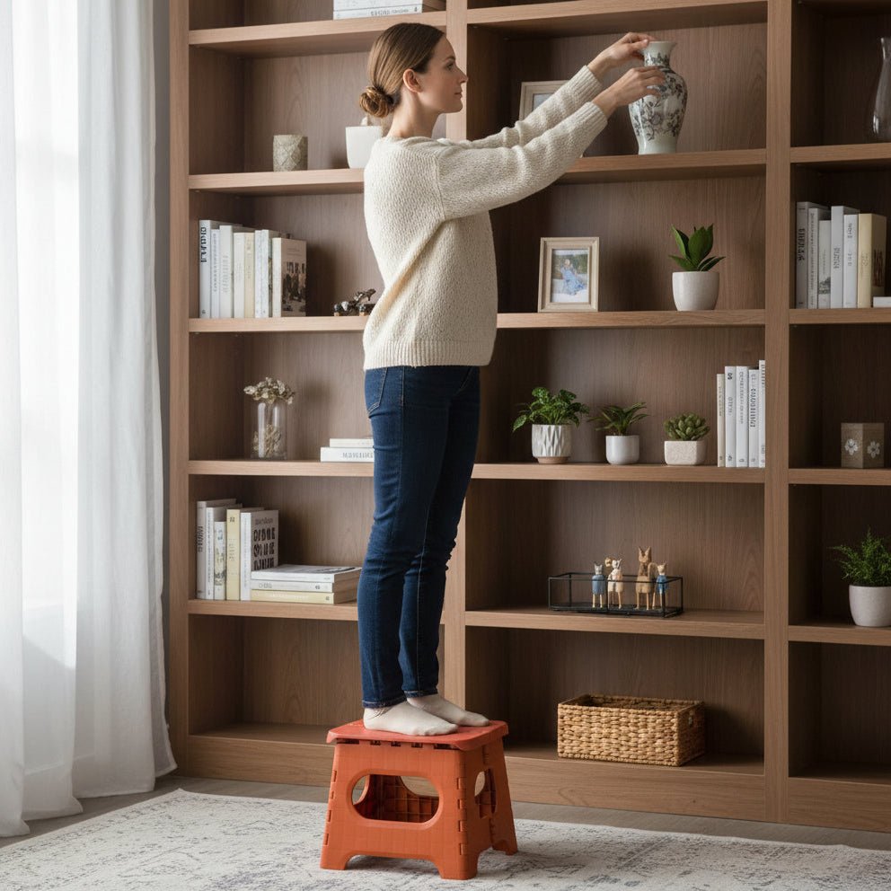 Folding stool with a handle
