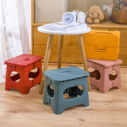 Folding stool with a handle