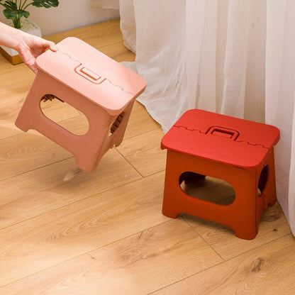 Folding stool with a handle