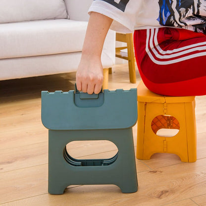 Folding stool with a handle