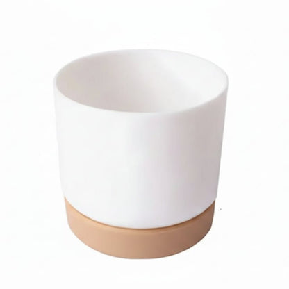 Compact self-watering planter