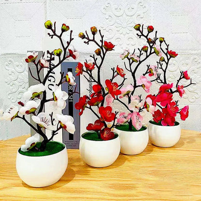Artificial flowering plum branch
