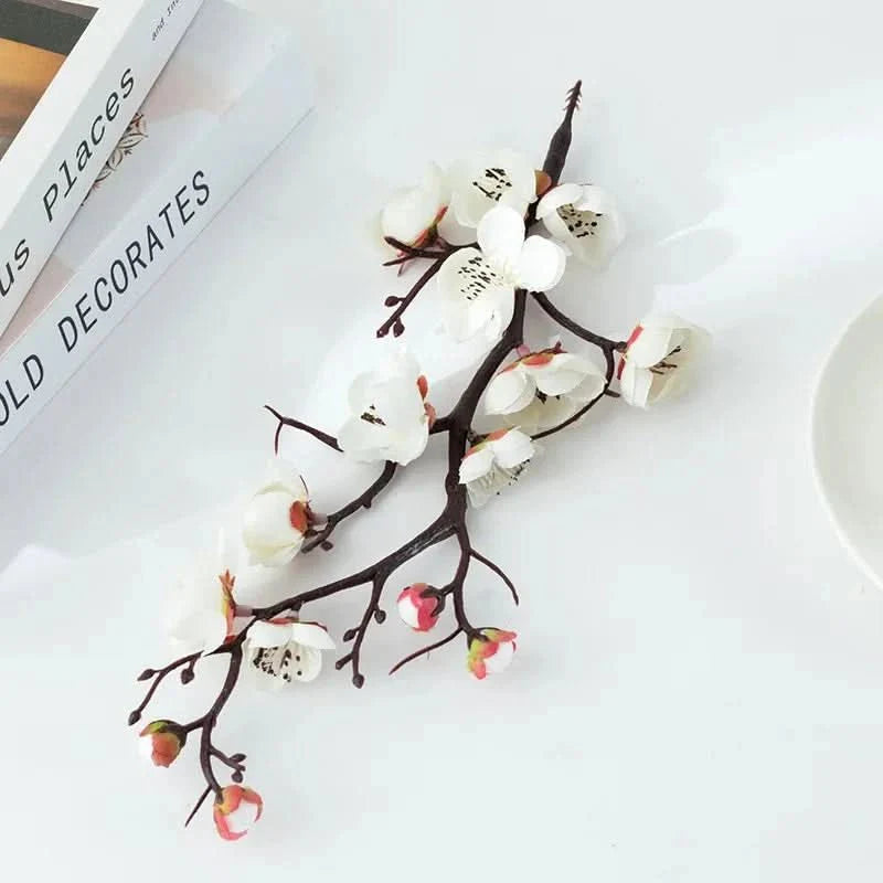 Artificial flowering plum branch