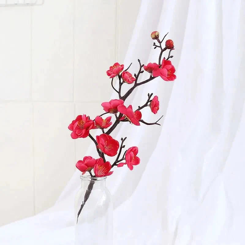 Artificial flowering plum branch