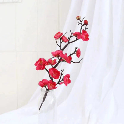 Artificial flowering plum branch