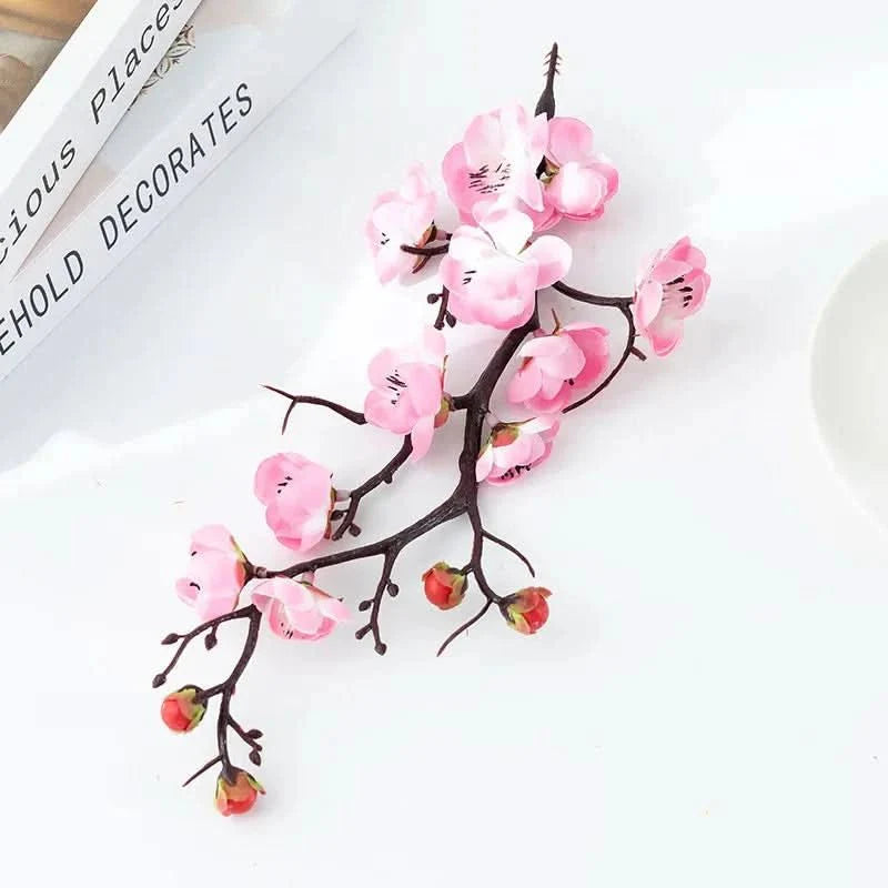 Artificial flowering plum branch
