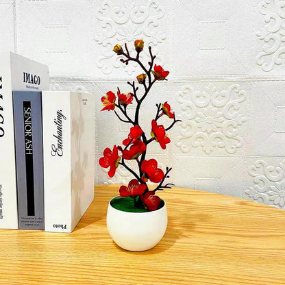 Artificial flowering plum branch