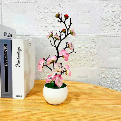 Artificial flowering plum branch