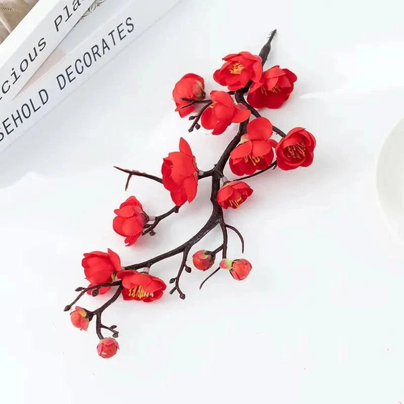 Artificial flowering plum branch