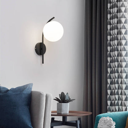 Wall lamp with a spherical shade