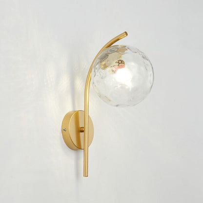 Wall lamp with a spherical shade