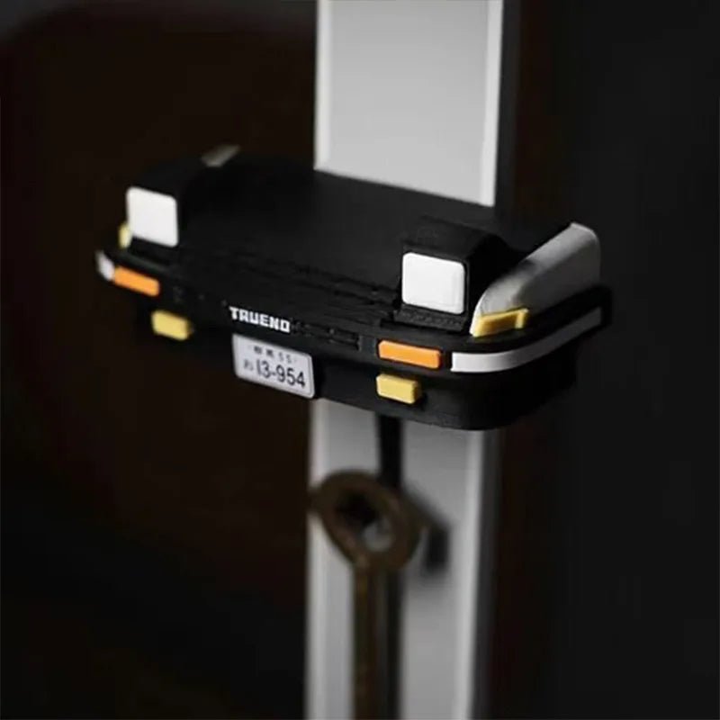 Key holder shaped like a spotlight