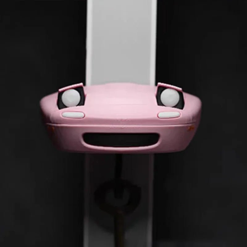 Key holder shaped like a spotlight