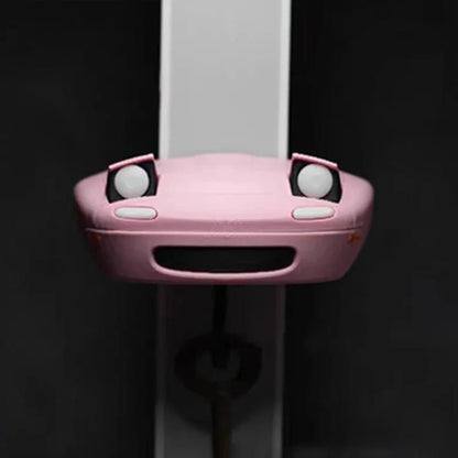 Key holder shaped like a spotlight