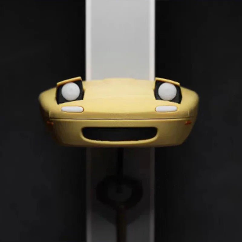 Key holder shaped like a spotlight