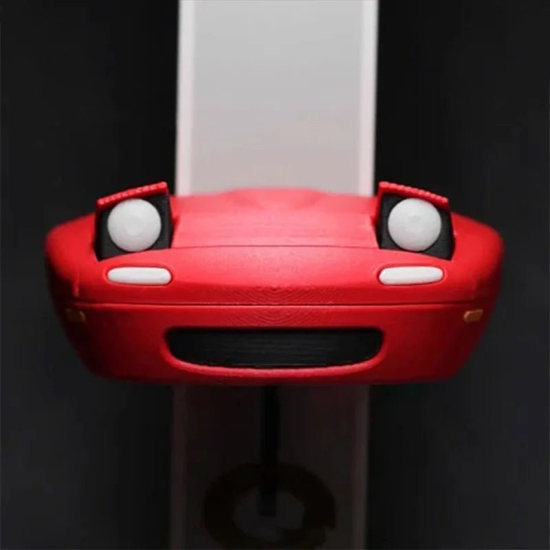 Key holder shaped like a spotlight