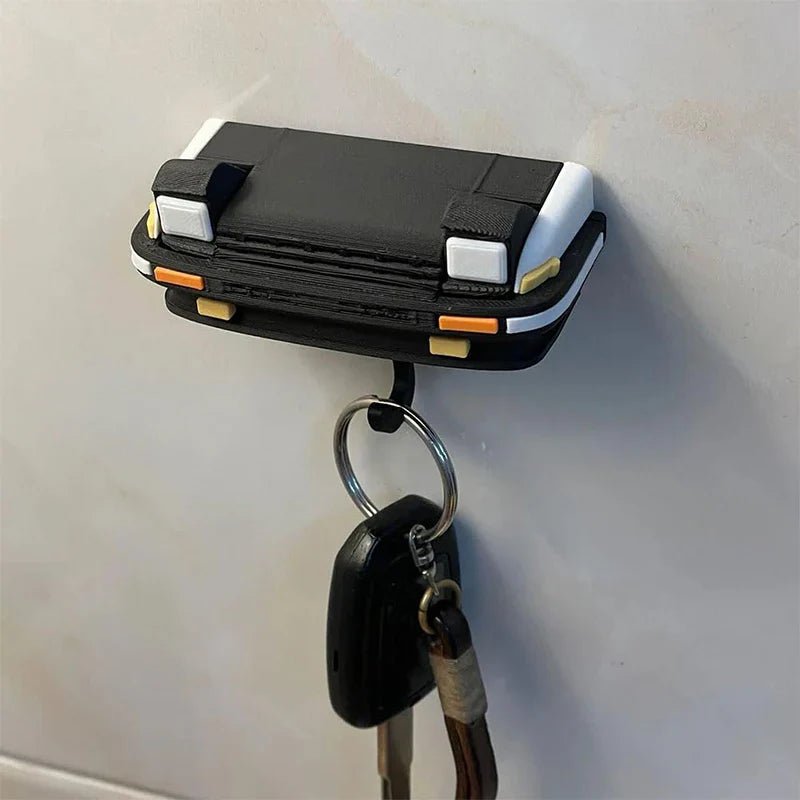 Key holder shaped like a spotlight