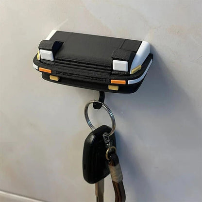 Key holder shaped like a spotlight