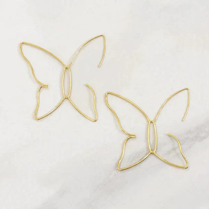 Grandes boucles d’oreilles papillon dorées
