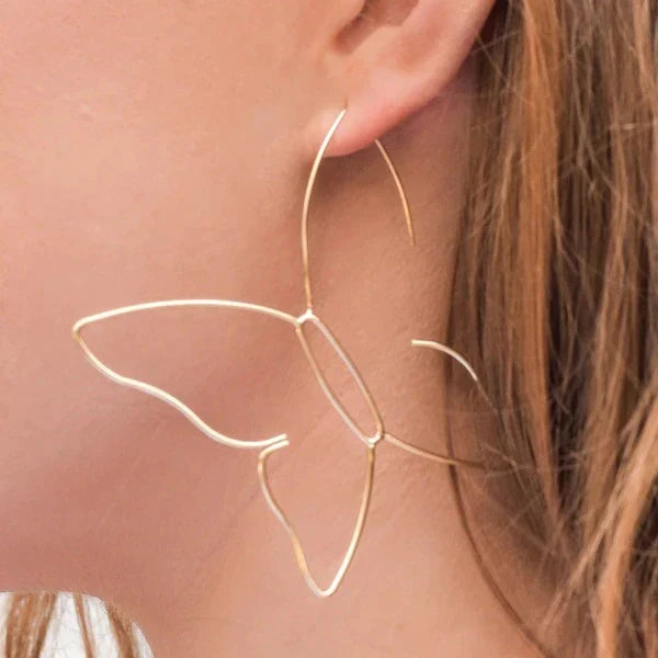 Grandes boucles d’oreilles papillon dorées
