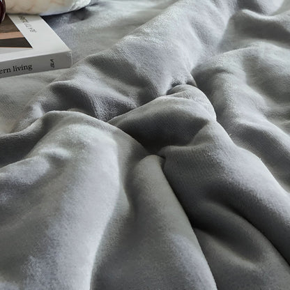 Double-sided quilted fleece blanket