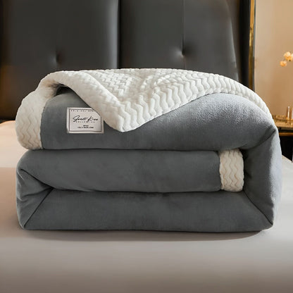 Double-sided quilted fleece blanket
