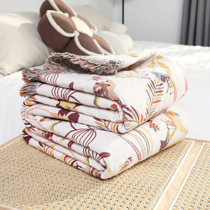Reversible cotton blanket with fringes