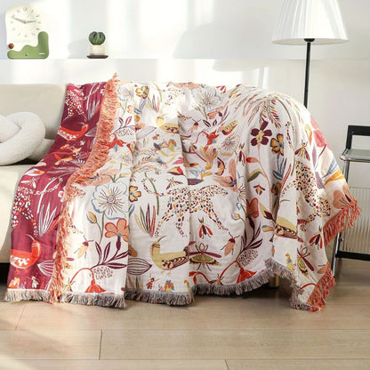 Reversible cotton blanket with fringes