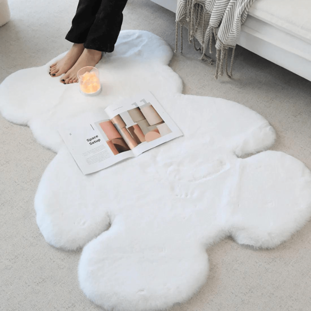 Plush mat with a teddy bear design